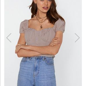 Button down blouse with ruffled sleeves